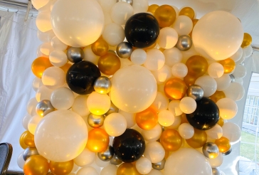 Gold Balloon Wall at Tent
