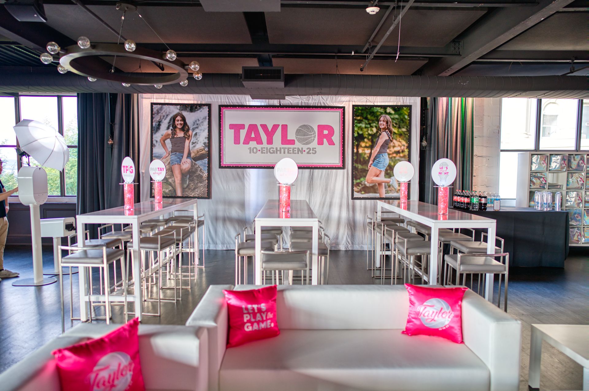 Basketball Themed Logo Sign with Blowup Photos on Drape at Hudson Loft