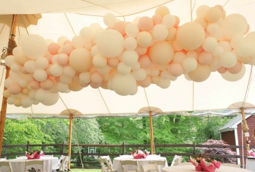 Organic Balloon Garland on Tent Ceiling