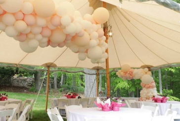 Organic Balloon Garland on Tent Ceiling
