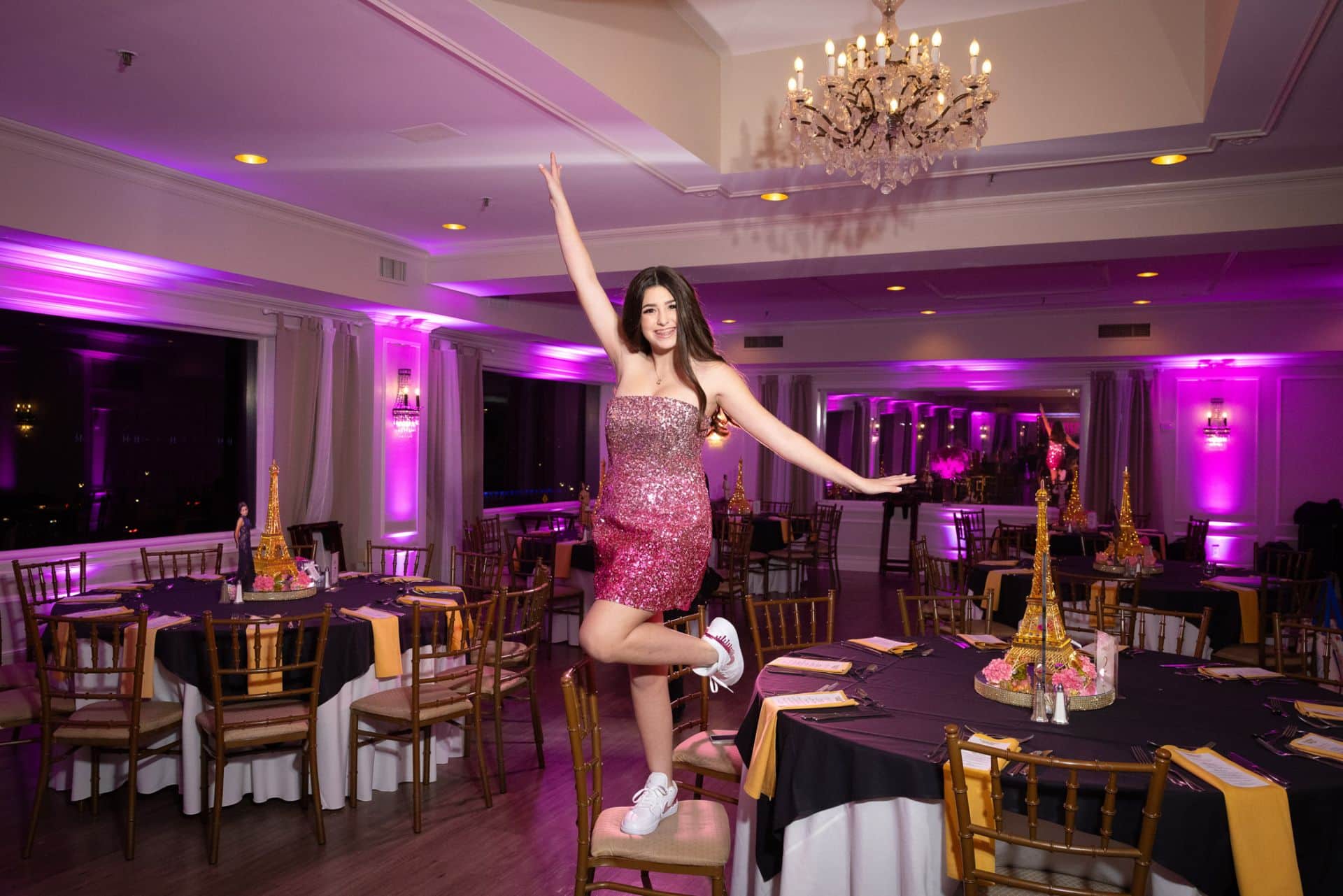 Audrey in Paris Theme Bat Mitzvah with Pink Uplighting and Eiffel Tower Centerpiece with Custom Cut Outs at Nyack Seaport
