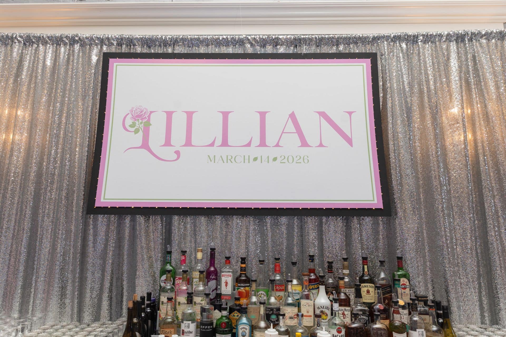 Printed Sign on a Silver Drape for a Love Shack Fancy Bat Mitzvah at Maplewood Country Club