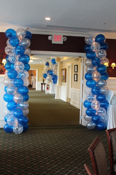 Blue & Silver Balloon Columns with Lights at Doorway