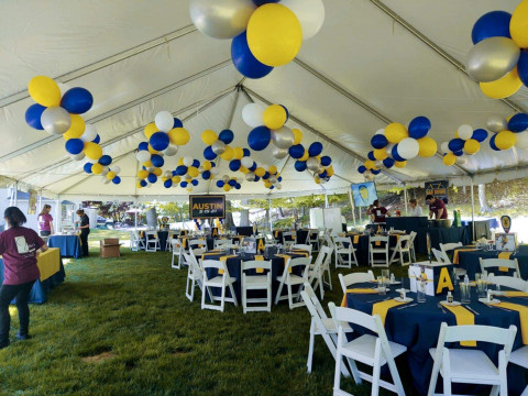 Yellow, Navy Blue. Silver & White Clusters of Balloons on Tent Ceiling For Outdoor Bar Mitzvah Decor
