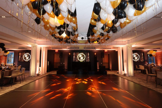 Gold, Black & White Ceiling Balloons with Shimmer Ribbon over Dance Floor for Graduation at Studio Gather, NYC