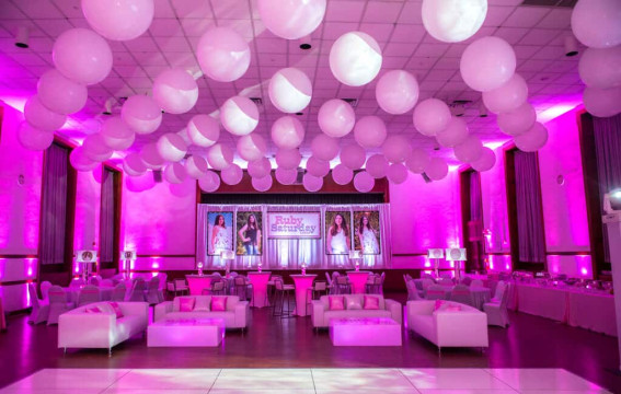 Club Themed Bat Mitzvah with White Balloons on Ceiling, Custom Lounge, Hot Pink Up-Lighting & Logo Backdrop at Temple Israel Center