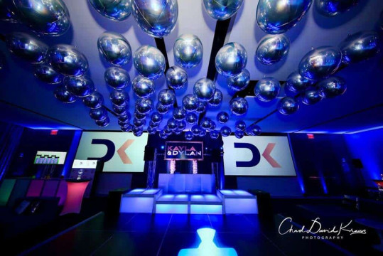 B'nai Mitzvah Setup with Silver Orbz Ceiling Treatment and Blue Uplighting at Apella, NYC
