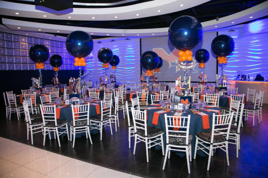 Syracuse Themed Bar Mitzvah with Football Centerpieces & 36" Navy & Orange Balloons at Club Vegas