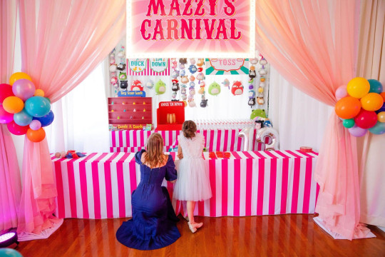 Custom Carnival Booth Setup with Draping, Custom Marquee Signage & Balloons
