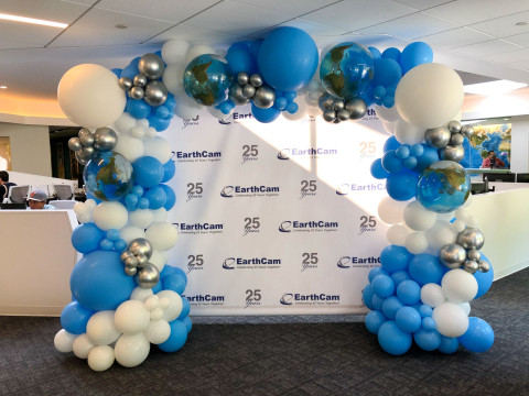 Organic Blue and White Balloon Arch Around Custom Step and Repeat for Corporate Event Decor