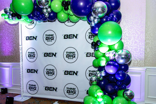 Neon Themed Step & Repeat with Balloon Garland