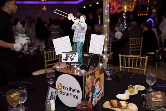 Music Themed Centerpiece with Custom Cutouts for Everything Boy Themed Bar Mitzvah