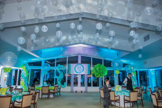 Turquoise Uplighting for Underwater Themed Bat Mitzvah with Clear Bubbles over Dance Floor & Custom Logo Backdrop at Rockrimmon Country Club
