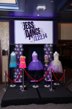 Dance Themed Backdrop with Dance Costume Display