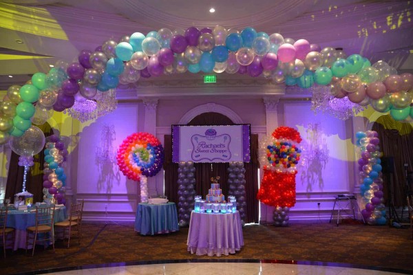 Candy Themed Backdrop with Whirly Pop & Gumball Machine Balloon Sculptures & Lights at The Rockleigh