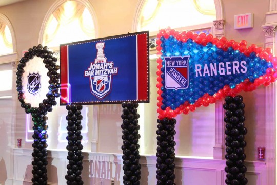 Rangers Backdrop with Custom Logo & Hockey Pennant & Puck Balloon Sculpture
