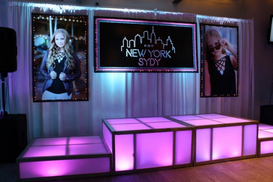NYC Themed Backdrop with Custom Logo & Blowup Photos