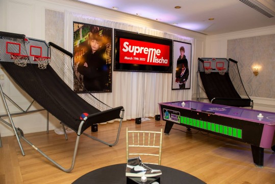 Supreme Themed Logo Sign with Blowup Photos