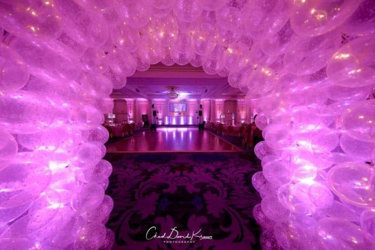 Balloon Tunnel Entrance with Star Balloons & Pink Lighting