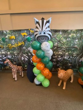 Safari Themed Balloon Column with Zebra Topper for Jungle Themed First Birthday
