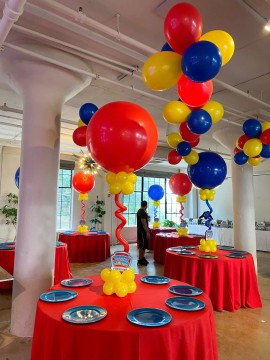 Paw Patrol Inspired Balloon Centerpiece and Balloon Cluster Ceiling Install for First Birthday Party