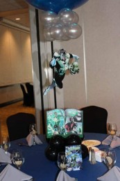Comic Book Themed Balloon Centerpiece with Floating Superheroes and Custom Table Signs