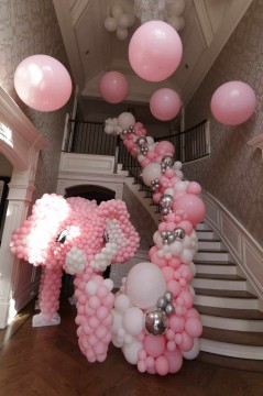 Elephant Balloon Sculpture with Organic Balloon Garland Over Stairway and Ceiling Treatment