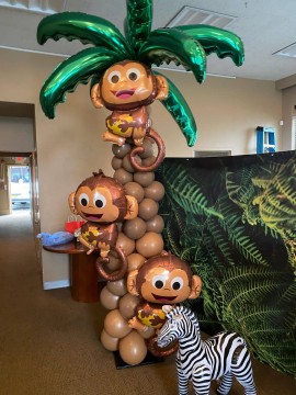 Palm Tree Balloon Sculpture with Monkeys for Jungle Themed First Birthday