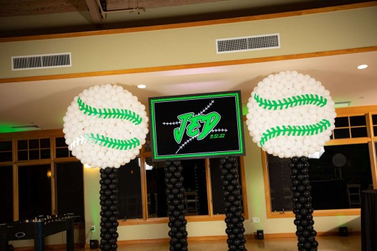Baseball Themed Balloon Sculptures with Custom Logo Backdrop