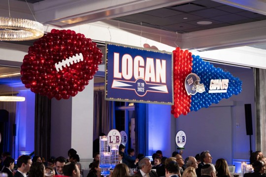 Football Themed Balloon Football & Pennant Sculptures with Custom Logo Backdrop for Bar Mitzvah at Alpine Country Club