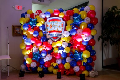 Custom Paw Patrol Themed Balloon Wall with Custom Sign for First Birthday Party