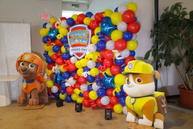 Beautiful Custom Paw Patrol Themed Balloon Wall with Custom Sign and Life-Size Cutout for First Birthday Party