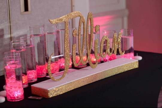 Gold Glitter Name Display with Hot Pink LED Cylinders for Bat Mitzvah Candle Lighting