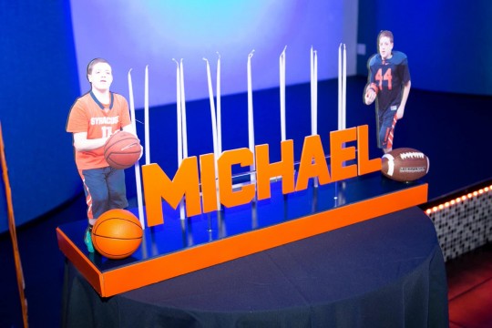 Syracuse Themed Candle Lighting Display with Photo Cutouts & Sports Balls