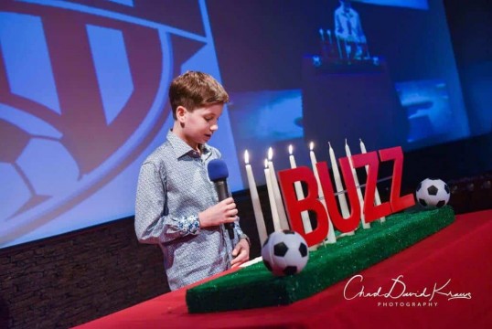 Soccer Themed Candle Lighting Display with Turf Base and White Pillar Candles