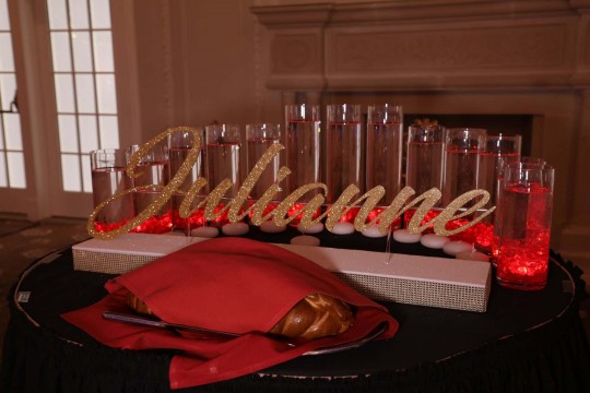 Gold Glitter Name Display with Red LED Cylinders for Hollywood Themed Bat Mitzvah
