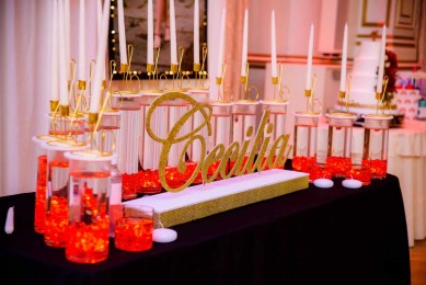 Music Themed Candle Lighting Display with LED Cylinders for Opera Themed Sweet Sixteen