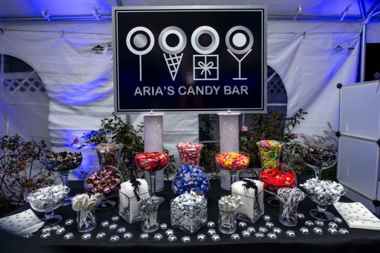 Black & White Candy Bar Setup with Custom Sign for Bat Mitzvah