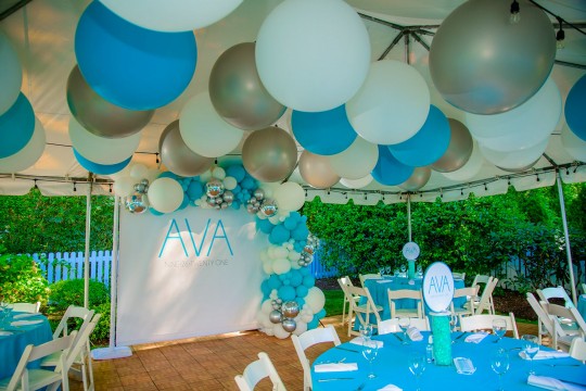 Beautiful Turquoise, White & Silver Jumbo Balloons over Tent Ceiling, Half Organic Arch, Custom Backdrop as Photo Op and Mini Logo Cocktail Centerpiece with Gems for Outdoor Party Decor