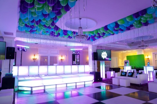 Colorful Loose Ceiling Balloons Over Dance Floor, Custom LED Lounge Set Up with Pillows and Mini Cocktail Centerpiece for Graffiti Themed Bat Mitzvah