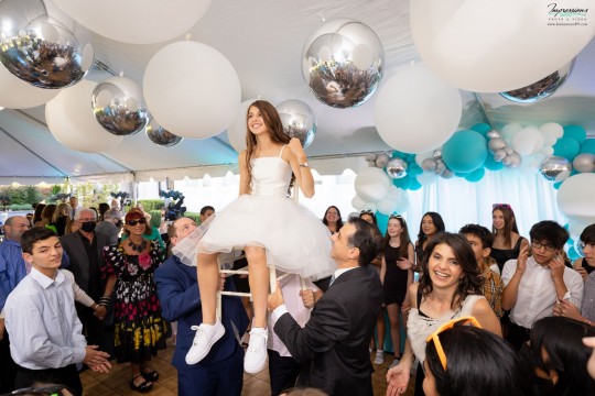 Beautiful Organic Balloon Arch and Ceiling Treatment for Tent Party with Large White Balloons and Metallic Silver Orbz