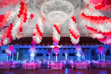 Cluster Balloon Garlands with Lights over Dance Floor
