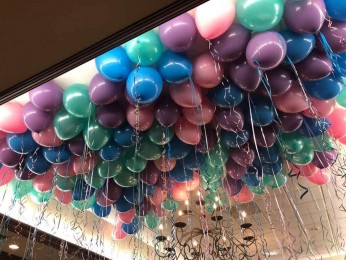 Pastel Colored Ceiling Balloons with Colored Ribbon at Stanton Ridge Country Club