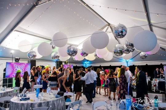Beautiful & Classic While Balloons and Silver Metallic Orbz Ceiling Treatment Over Dance Floor and Custom Logo Centerpiece with Gems for Tent Party Decor