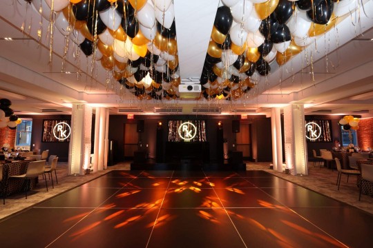 Gold, Black & White Ceiling Balloons with Shimmer Ribbon over Dance Floor for Graduation at Studio Gather, NYC