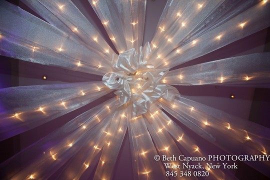 White Sparkle Organza with Lights Swagged from Ceiling