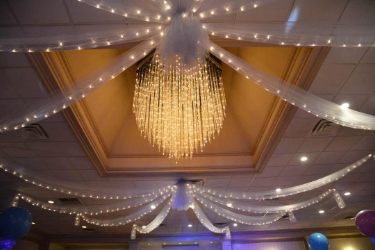 Silver Tulle Swagged over Dance Floor with Lights at Town & Country