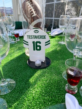 Custom Cutout Football Jersey Table Sign on a Turf Table Topper for Jets Themed Bar Mitzvah
