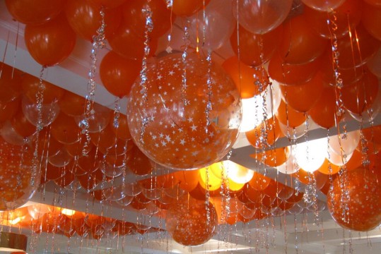 Orange Ceiling Balloons with Exploding Balloon Release