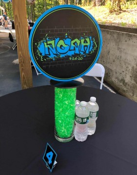 Graffiti Themed Lounge Centerpiece with Custom Logo on Cylinder with Crystal Chips